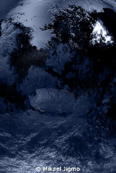Seascape from the moon by Mikael Jigmo 